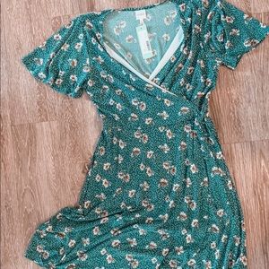 Brand new green floral wrap dress.